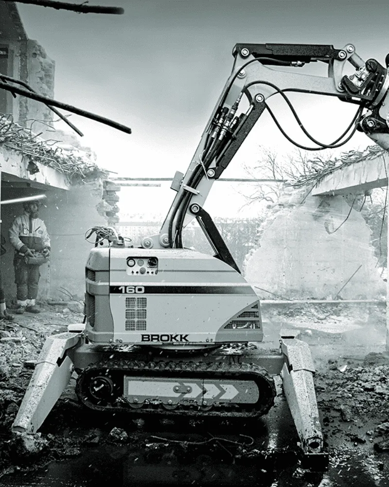 A Brokk demolition robot working on structural demolition