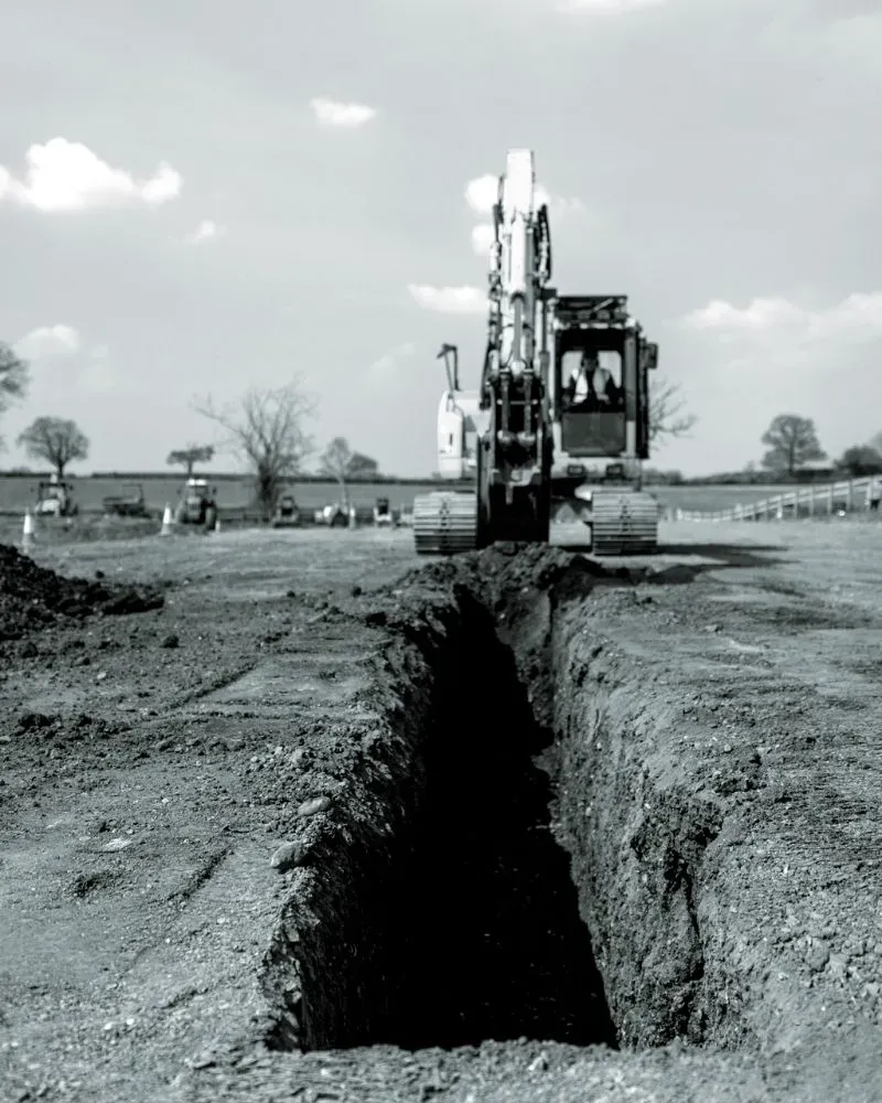 Excavated drainage trench on a groundworks package