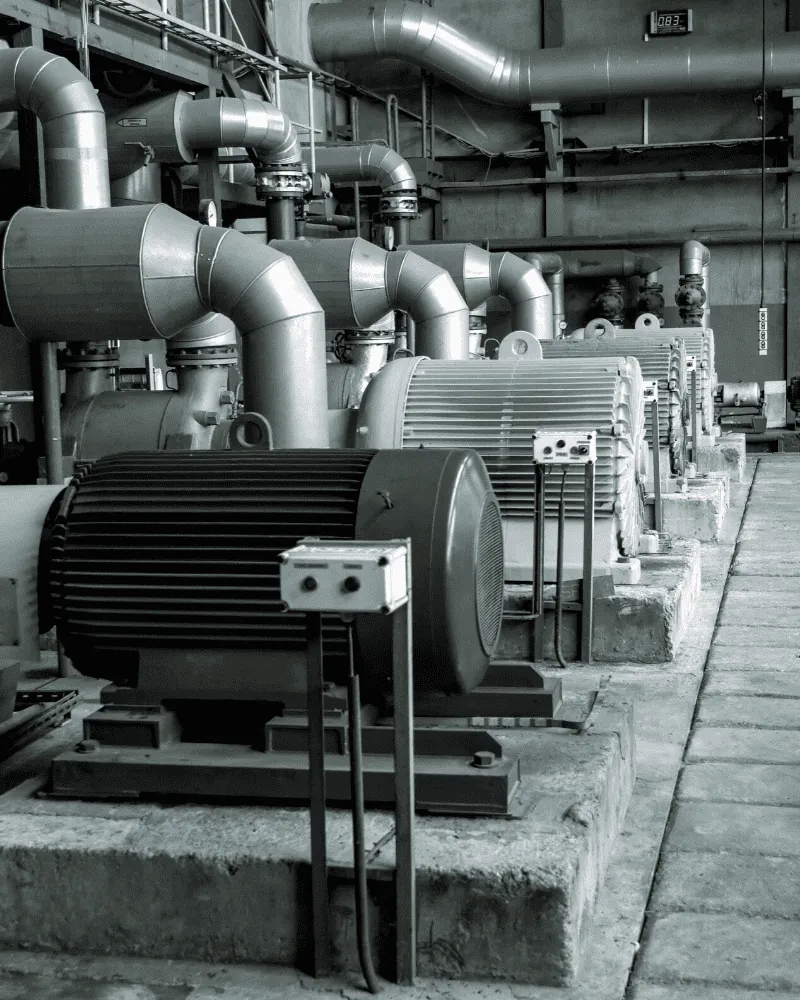 Motors and plant awaiting strip out in a plant room