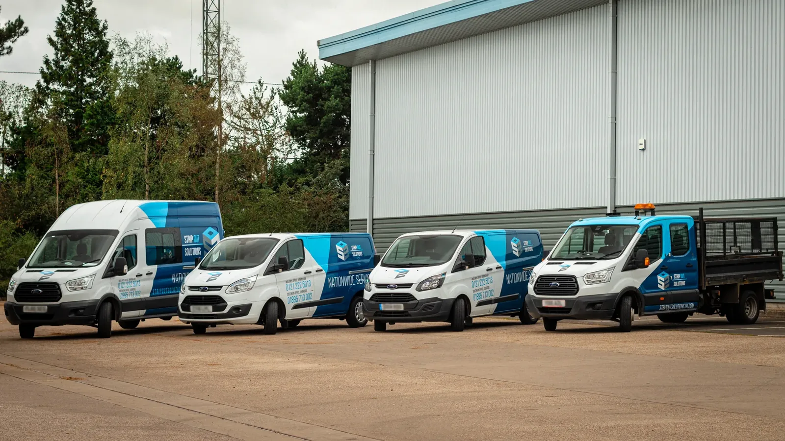 The Strip Out Solutions liveried fleet