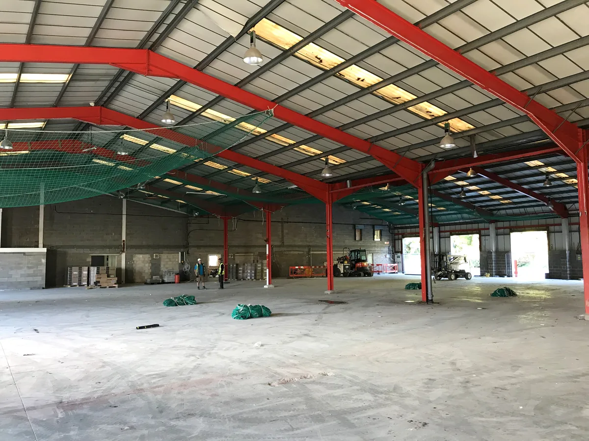 A cleared warehouse mid-way through enabling works