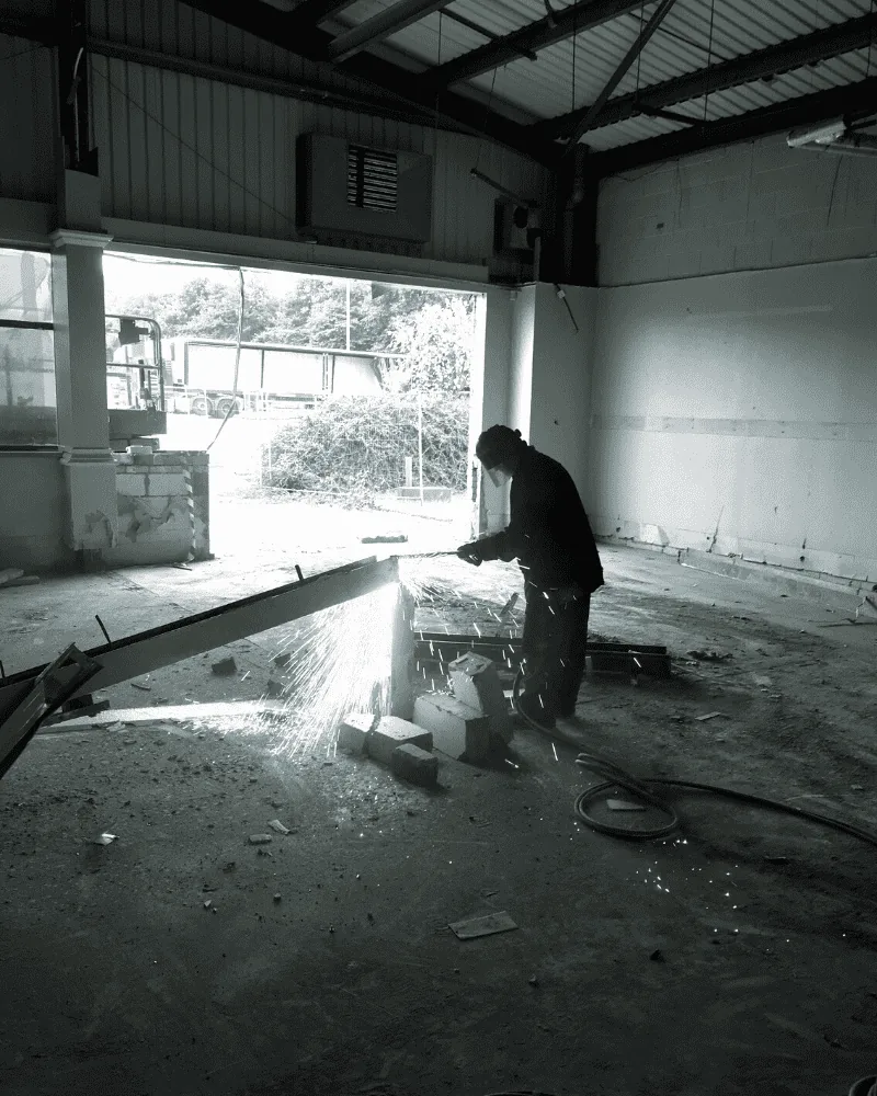 SOS operative cutting steel during a strip out